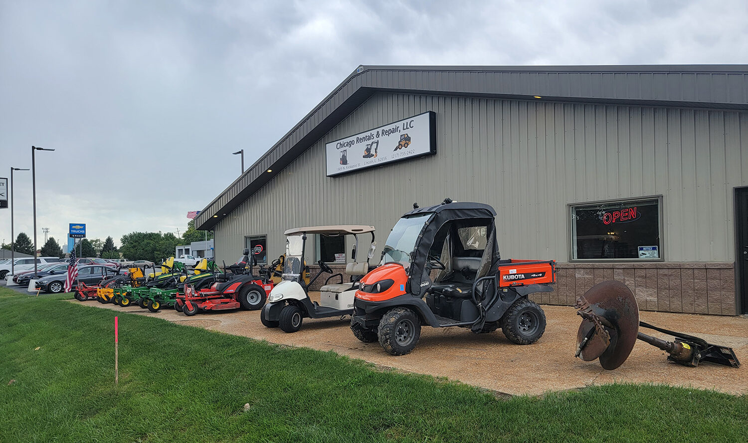 Chicago Rental & Repair exterior showcasing larger lawn and landscaping equipment available for rent - Lincoln, IL